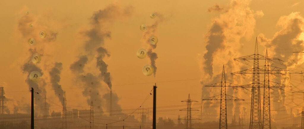 Industrial sprawl at sunset: countless tall chimneys belch smoke alongside crisscrossing power lines. In the smoke, the outline of "physical" Bitcoins can be seen.
