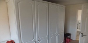 A pair of large wardrobes.