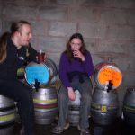 Dan & Claire drink beer in a lambing shed