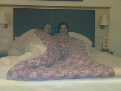 Dan and Faye in bed together