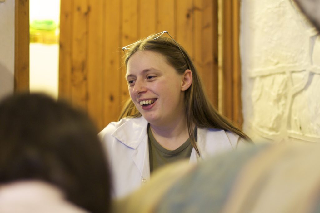 Ruth in a lab coat.