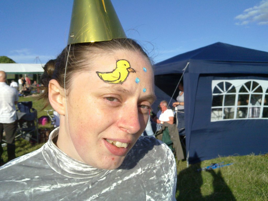 Ruth with a duck on her head. Sort of.