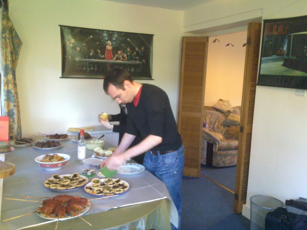 Simon laying out food.