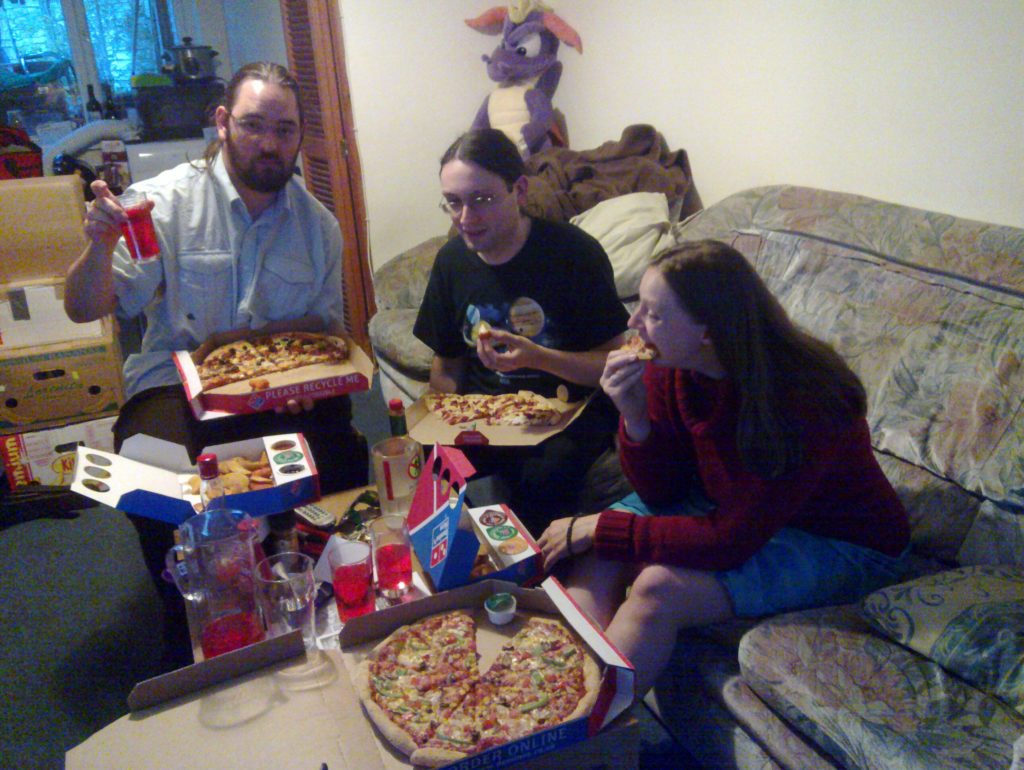 JTA, Paul and Ruth eat pizza and drink Earth Sunset.