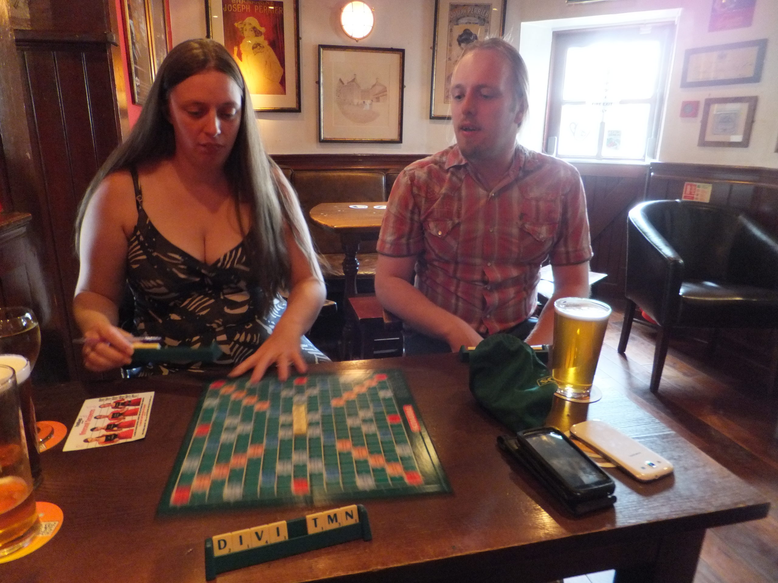 Ruth and Dan playing Scrabble[TM] in a pub in Leith.