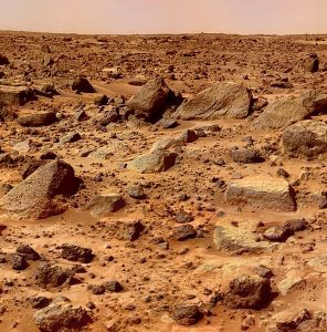 Photograph of Mars as taken by a rover.