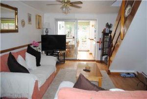 The living room and stairwell of one of the houses we first ruled-out.