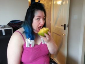 My sister devours a mango.