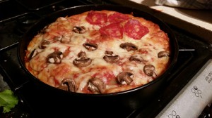 Pizza cake freshly removed from the oven.