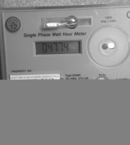 Electricity meter with red light showing.
