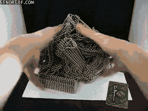 Reverse GIF of a cube of magnetic balls