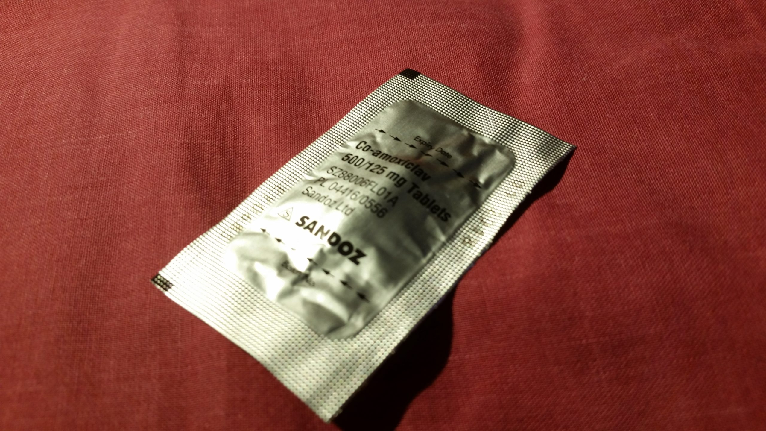 Co-amoxiclav tablet in packaging.