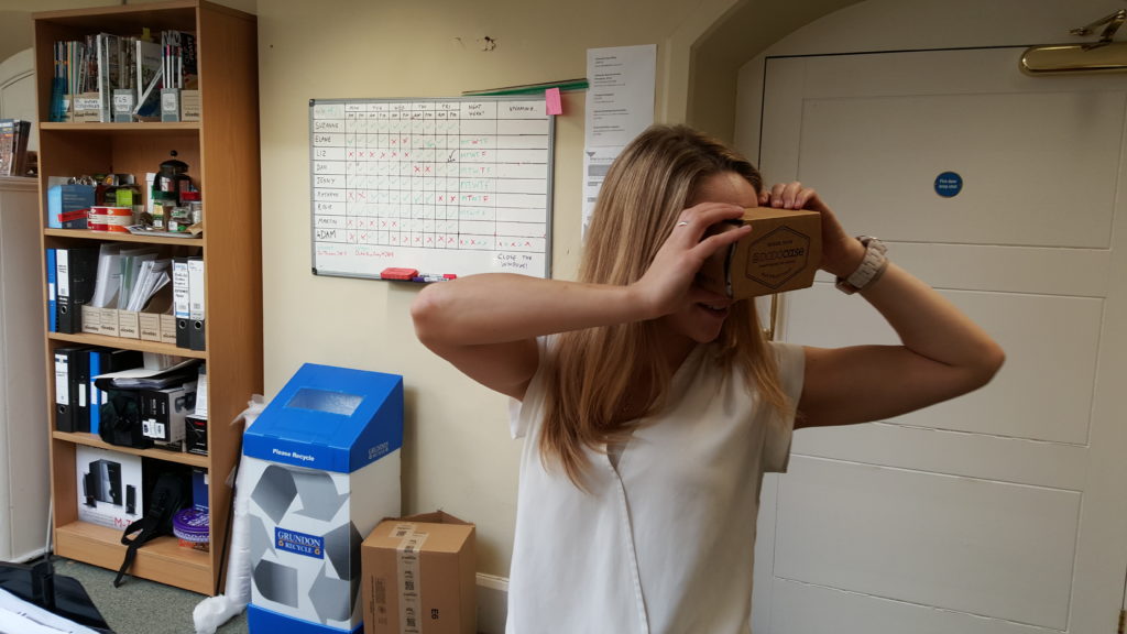 Liz plays with a Google Cardboard.