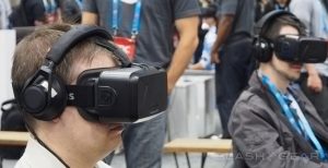 Two gamers wearing Oculus Rift headsets.