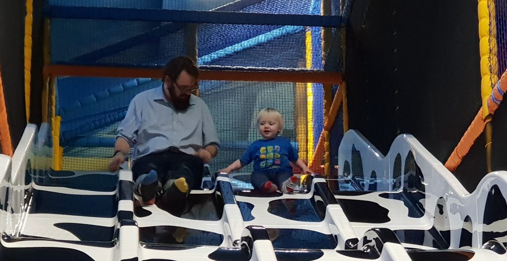 JTA with his youngest, on a slide.
