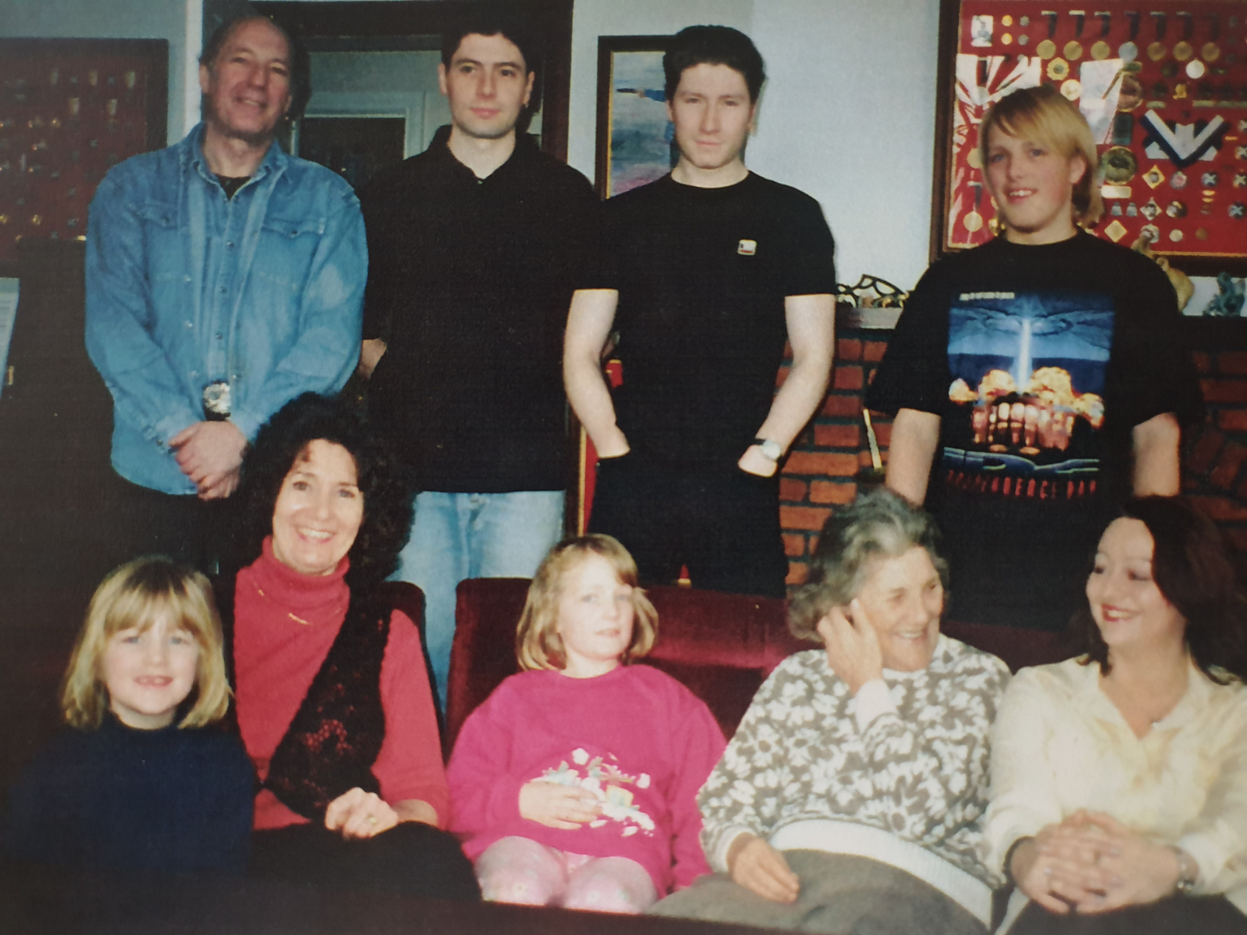 Dan with his Uncle Tom, Aunt Anne, cousins Thomas and Stephen, sisters, grandmother, and a woman who's probably the girlfriend of one of his cousins