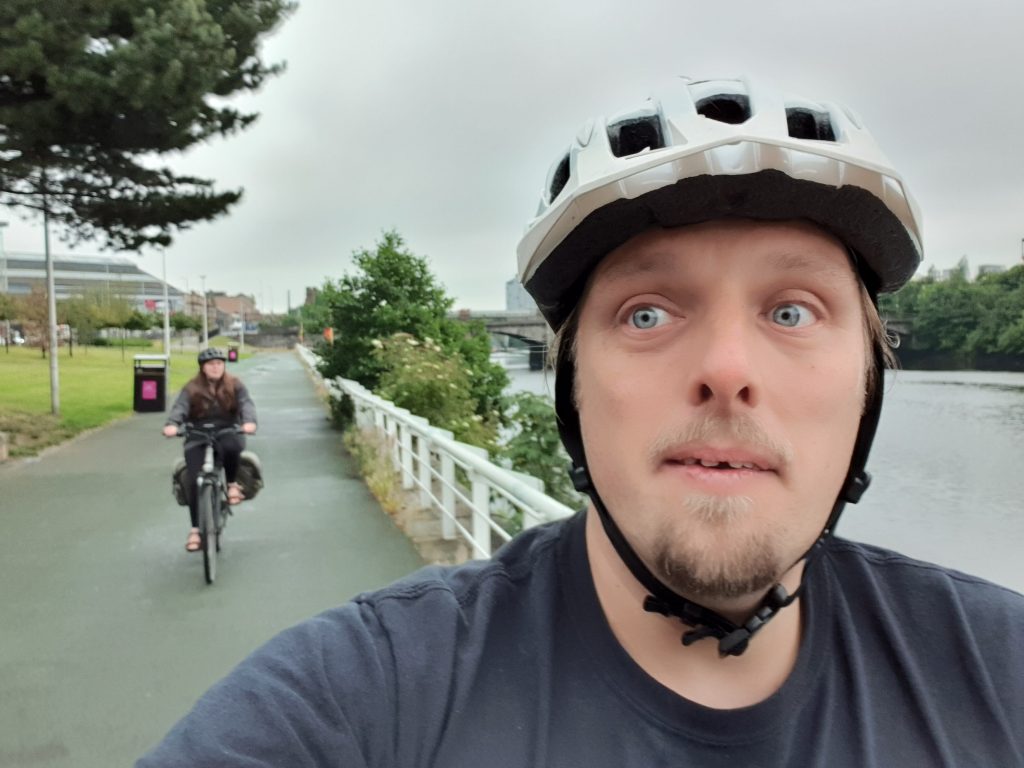 Dan and Ruth cycle alongside the Clyde.