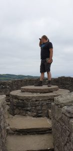 Dan atop a plinth in Craigmillar Castle