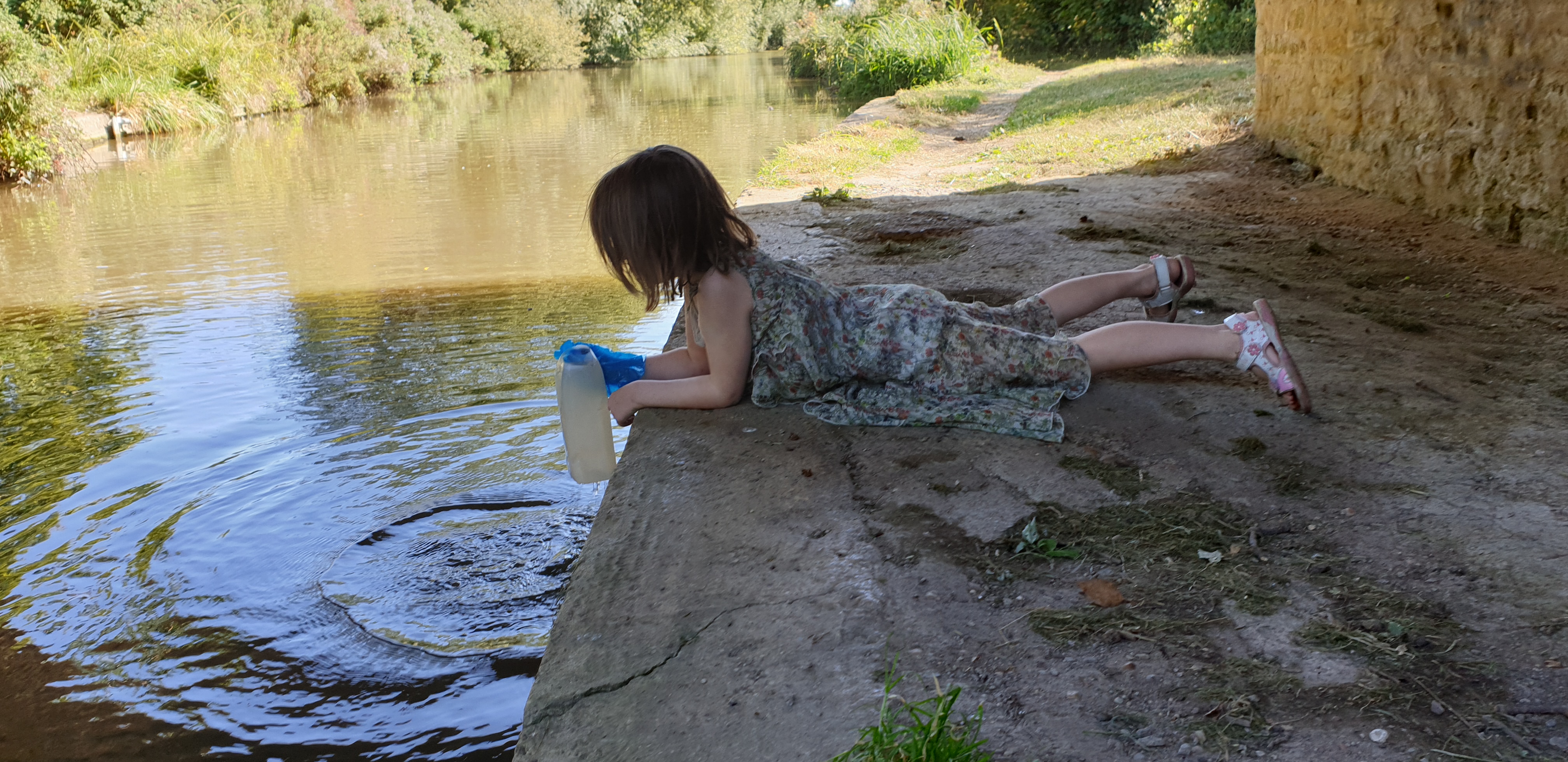 Annabel fetches water from the canal.