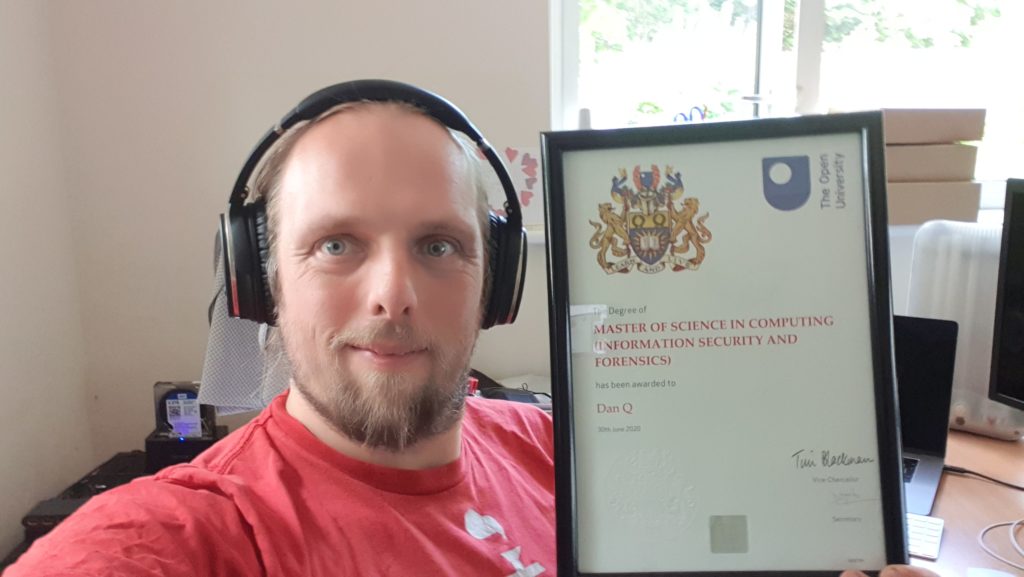 Dan with his Masters Degree certificate (Master of Science in Computing: Information Security and Forensics)