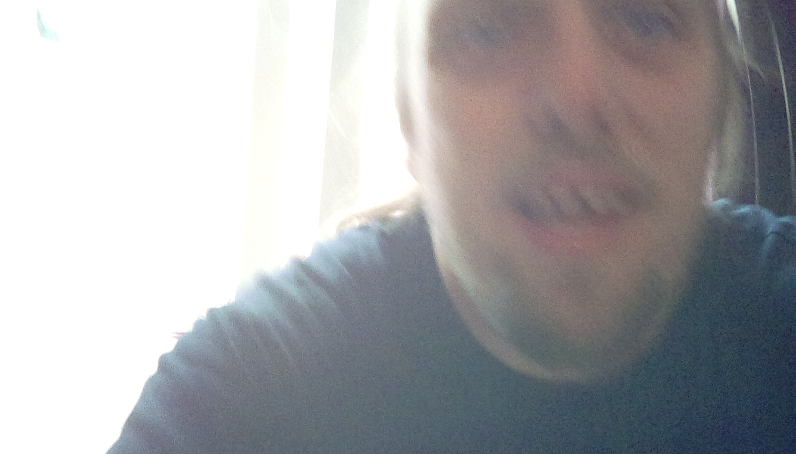 Extremely blurred close-up photo of Dan's face.