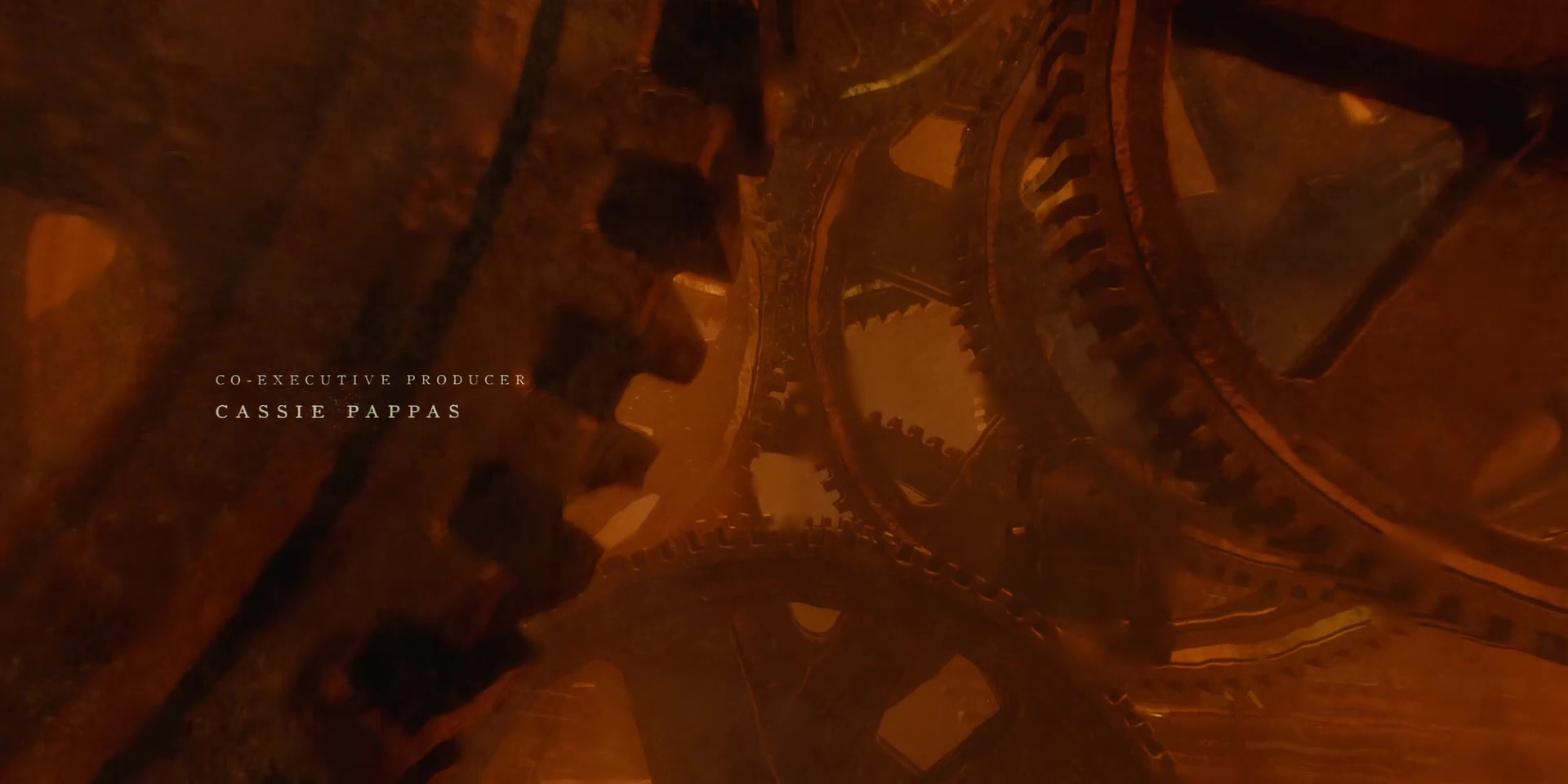 Many cogs whirl in a firey light.
