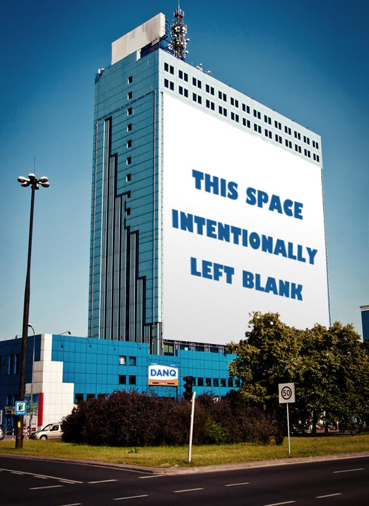 Building-sized billboard saying "THIS SPACE INTENTIONALLY LEFT BLANK".