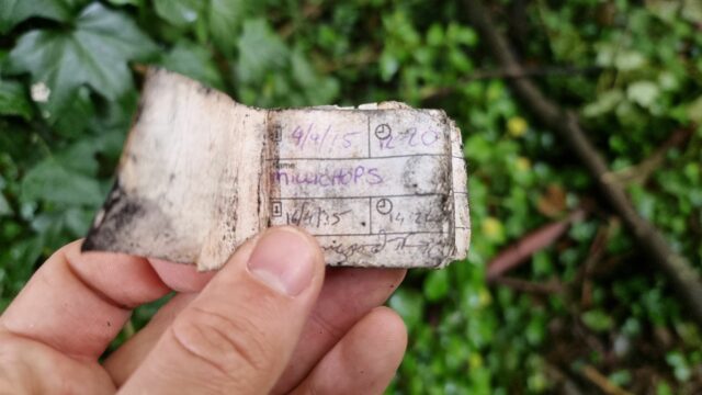 Damp geocaching log book,open.