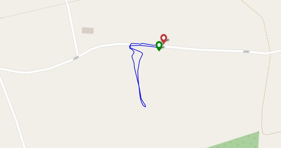 Map showing walking from alongside a field into the field and back again.