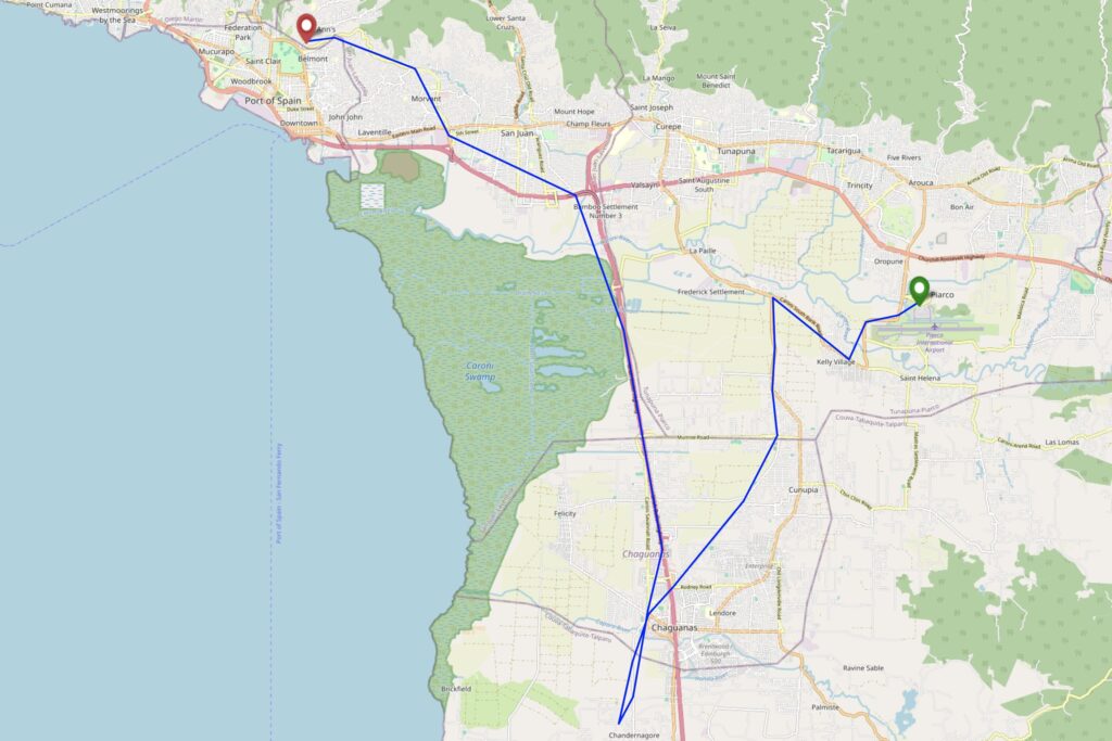 Map showing a zig-zagging route from Piarco airport in West Trinidad South-West to near Chaguanas then North again to the edge of the mountains overlooking Port of Spain.