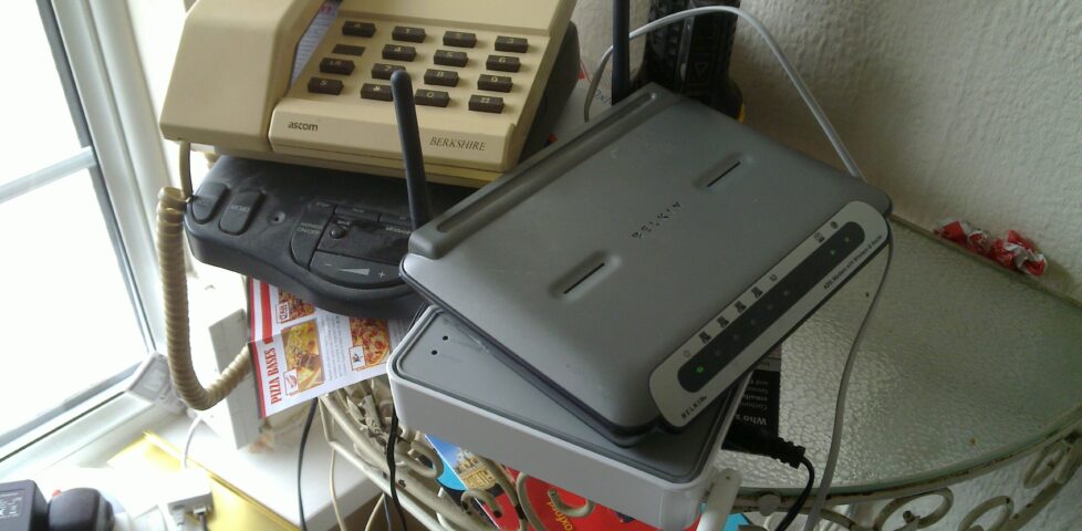 Magic Internet-box one, bottom right, hates me. Magic Internet-box two, on top of it, hates JTA. And yes, that phone does look familiar, doesn't it.