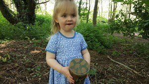 Annabel with a geocache.
