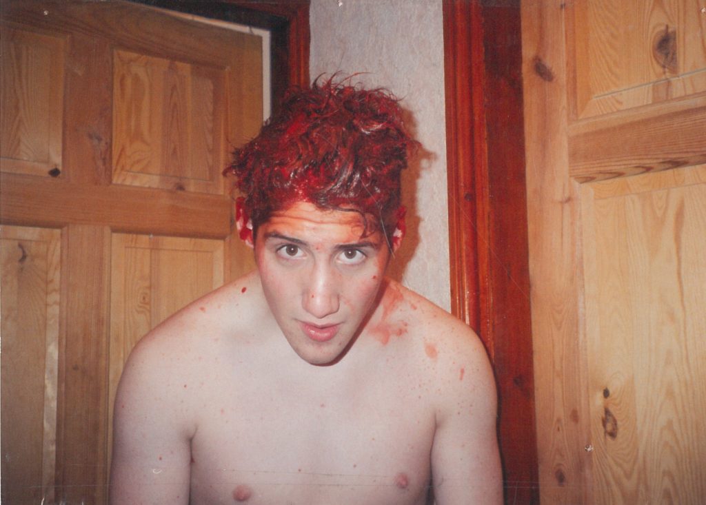 Gary covered with red hair dye