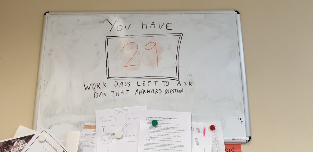 Dan's whiteboard: "You have [29] work days left to ask Dan that awkward question".