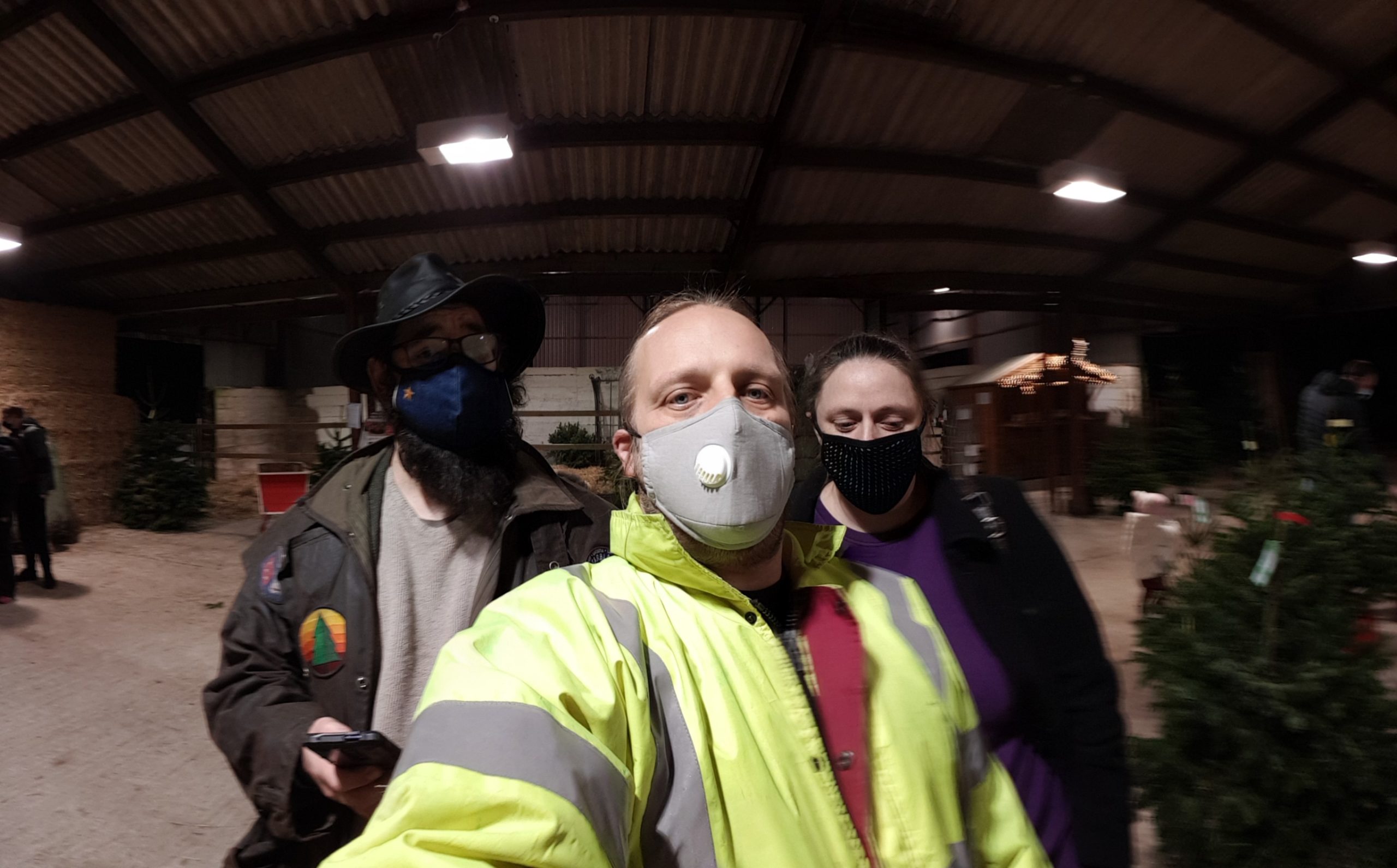 JTA, Dan and Ruth shopping for a Christmas tree, wearing face masks
