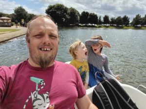 Dan and the kids on a swan boat.