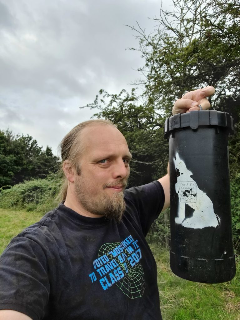 Dan with Oxford's the Wild Wolf 3 final stage cache container.
