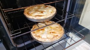 Butter pies in an oven.