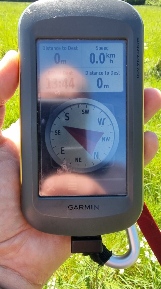 GPS receiver showing 0 metres.